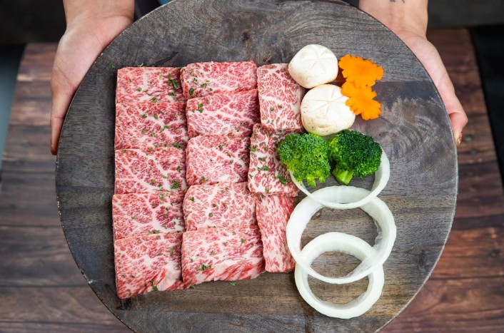 Tender Wagyu beef served with fresh broccoli and onions