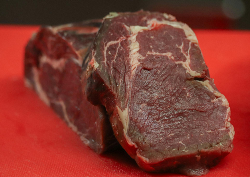 A lean, trimmed ribeye cut ready for cooking